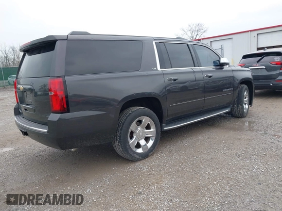2015 Chevrolet Suburban LTZ with VIN 1GNSKKKC4FR712965, listed as a IAAI auction lot 41928053 with 188,571 mi miles. Bid and sale history available at carsss.com. Image 4.