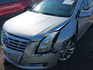 2013 Cadillac XTS Premium z VIN 2G61S5S30D9184910, wystawiony jako IAAI lot #40220419 z przebiegiem 111 330 mil mil oraz . Historia ofert i sprzedaży dostępna na DreamBid. Obrazek 6.