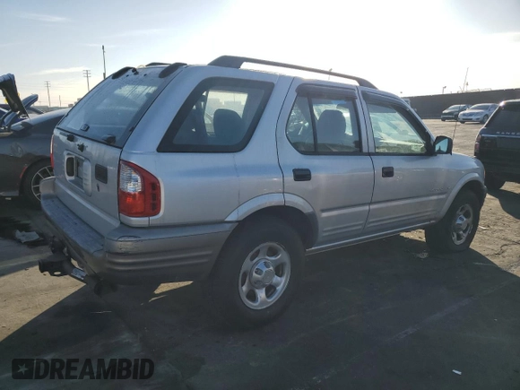 2000 Isuzu Rodeo S z VIN 4S2CK58W2Y4311726, wystawiony jako Copart lot #85070364 z przebiegiem 226 510 mil mil oraz Szkody całkowita. Historia ofert i sprzedaży dostępna na DreamBid. Obrazek 3.