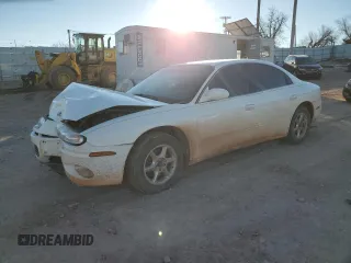 2002 Oldsmobile Aurora z VIN 1G3GR64H024127902, wystawiony jako Copart lot #86681674 z przebiegiem Nie podano mil oraz Szkody całkowita. Historia ofert i sprzedaży dostępna na DreamBid. Obrazek 1.