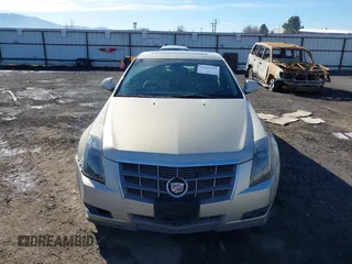 2009 Cadillac CTS AWD z VIN 1G6DT57V990107958, wystawiony jako IAAI lot #41685415 z przebiegiem 148 294 mil mil oraz . Historia ofert i sprzedaży dostępna na DreamBid. Obrazek 13.