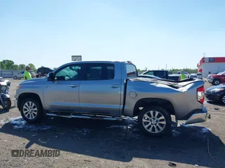 2014 Toyota Tundra 4WD Truck LTD with VIN 5TFHW5F17EX332059, listed as a IAAI auction lot 42030610 with 248,676 mi miles. Bid and sale history available at carsss.com. Image 14.