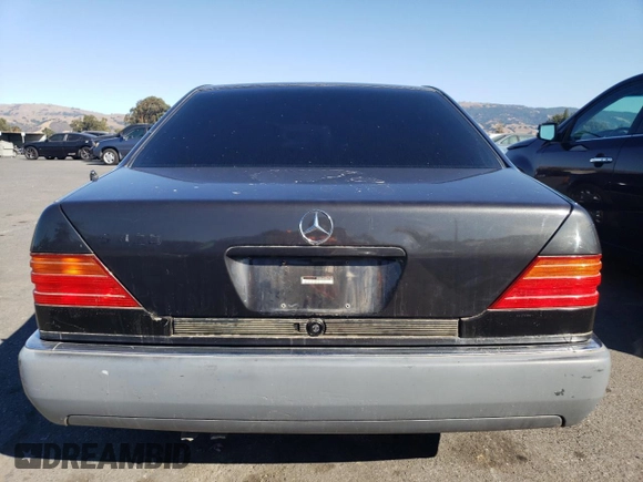 1994 Mercedes-Benz S with VIN WDBGA43E7RA171148, listed as a Copart auction lot 75522703 with 91,894 mi miles and Clean Title. Bid and sale history available at DreamBid. Image 6.