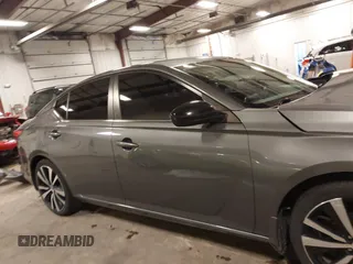 2019 Nissan Altima SR with VIN 1N4BL4CV6KC186522, listed as a IAAI auction lot 41773234 with 95,654 mi miles and . Bid and sale history available at DreamBid. Image 14.