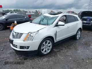 2015 Cadillac SRX Performance Collection with VIN 3GYFNFE35FS613177, listed as a IAAI auction lot 42102352 with Not provided miles and . Bid and sale history available at DreamBid. Image 2.