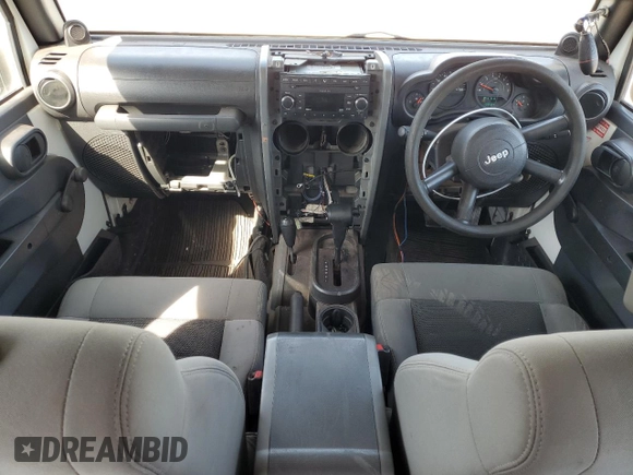 2008 Jeep Wrangler X with VIN 1J4FZ24128L612526, listed as a Copart auction lot 49152275 with 128,584 mi miles and Clean title. Bid and sale history available at DreamBid. Image 8.