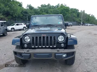 2016 Jeep Wrangler Unlimited Sahara z VIN 1C4HJWEG3GL343340, wystawiony jako IAAI lot #42683859 z przebiegiem 92 878 mil mil oraz . Historia ofert i sprzedaży dostępna na DreamBid. Obrazek 13.