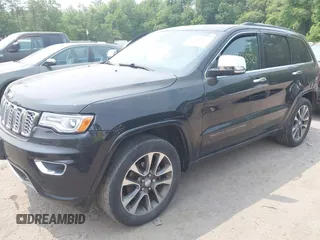 2017 Jeep Grand Cherokee Overland z VIN 1C4RJFCG4HC632929, wystawiony jako IAAI lot #42385321 z przebiegiem 205 593 mil mil oraz . Historia ofert i sprzedaży dostępna na DreamBid. Obrazek 17.