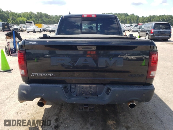 2015 Ram 1500 Rebel z VIN 1C6RR7YT4FS751370, wystawiony jako Copart lot #61675064 z przebiegiem 90 245 mil mil oraz Szkoda całkowita • Salvage title. Historia ofert i sprzedaży dostępna na DreamBid. Obrazek 6.