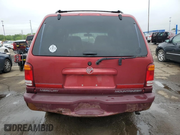 1999 Mercury Mountaineer with VIN 4M2DU55P5XUJ16364, listed as a Copart auction lot 57493435 with 166,256 mi miles and Clean title. Bid and sale history available at DreamBid. Image 6.