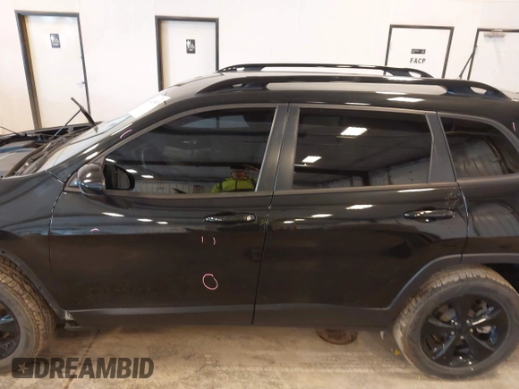 2016 Jeep Cherokee Latitude with VIN 1C4PJMCS6GW214045, listed as a IAAI auction lot 42440361 with 115,863 mi miles and . Bid and sale history available at DreamBid. Image 14.