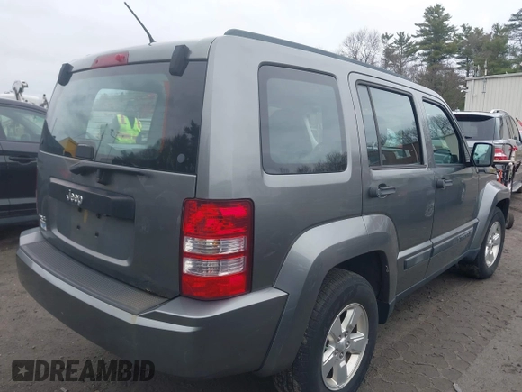 2012 Jeep Liberty Sport with VIN 1C4PJMAK4CW199803, listed as a IAAI auction lot 42025900 with 169,824 mi miles and . Bid and sale history available at carsss.com. Image 4.