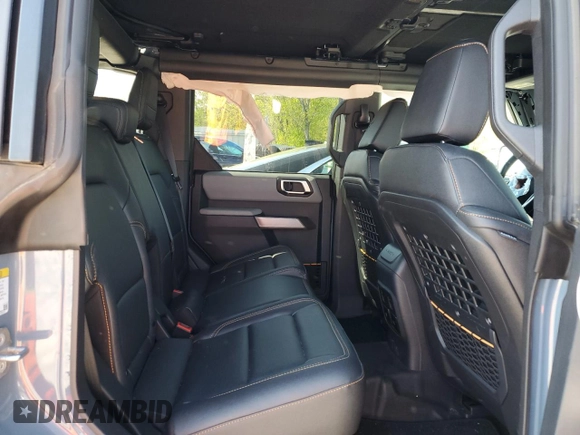 2023 Ford Bronco with VIN 1FMEE5DH2PLB00979, listed as a Copart auction lot 56652305 with 31,653 mi miles and Salvage title. Bid and sale history available at DreamBid. Image 11.