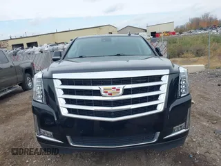 2019 Cadillac Escalade Luxury z VIN 1GYS4BKJ1KR398505, wystawiony jako IAAI lot #40662422 z przebiegiem 57 932 mil mil oraz . Historia ofert i sprzedaży dostępna na DreamBid. Obrazek 12.