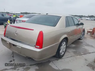 2006 Cadillac DTS 1SC z VIN 1G6KD57Y56U102470, wystawiony jako IAAI lot #40758530 z przebiegiem 149 330 mil mil oraz . Historia ofert i sprzedaży dostępna na DreamBid. Obrazek 4.