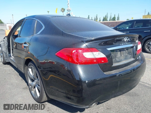 2011 Infiniti M with VIN JN1BY1AP1BM324835, listed as a IAAI auction lot 42592066 with 208,124 mi miles and . Bid and sale history available at DreamBid. Image 3.