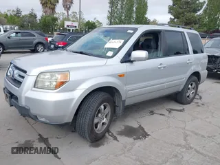 2006 Honda Pilot EX-L with VIN 2HKYF186X6H554433, listed as a IAAI auction lot 42111274 with 212,610 mi miles and . Bid and sale history available at carsss.com. Image 2.