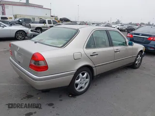 1995 Mercedes-Benz C with VIN WDBHA28E2SF191740, listed as a IAAI auction lot 41172625 with 331,540 mi miles. Bid and sale history available at carsss.com. Image 4.