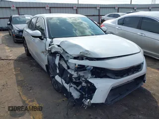 2024 Honda Civic EX-L z VIN 19XFL1H71RE027446, wystawiony jako IAAI lot #41687376 z przebiegiem 5381 mil mil oraz . Historia ofert i sprzedaży dostępna na DreamBid. Obrazek 1.
