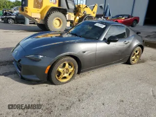 2017 Mazda MX-5 Miata Club with VIN JM1NDAL78H0109701, listed as a Copart auction lot 61522595 with 100,825 mi miles and Salvage title. Bid and sale history available at DreamBid. Image 1.