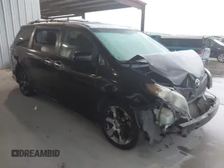 2014 Toyota Sienna SE with VIN 5TDXK3DC5ES456630, listed as a IAAI auction lot 42370657 with 164,633 mi miles and . Bid and sale history available at DreamBid. Image 1.