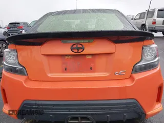 2015 Scion tC with VIN JTKJF5C79FJ007842, listed as a IAAI auction lot 41560881 with 155,436 mi miles. Bid and sale history available at carsss.com. Image 16.