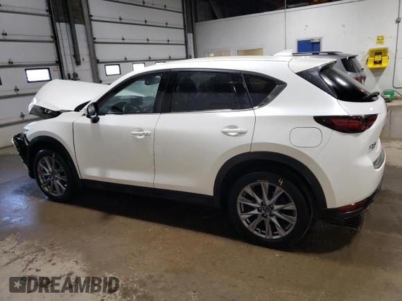 2020 Mazda CX-5 Grand Touring with VIN JM3KFBDM5L1851734, listed as a Copart auction lot 56729585 with 39,023 mi miles and Salvage title. Bid and sale history available at DreamBid. Image 2.