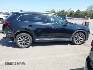 2016 Mazda CX-9 Grand Touring with VIN JM3TCBDY4G0113693, listed as a IAAI auction lot 41965857 with 152,403 mi miles and . Bid and sale history available at DreamBid. Image 14.