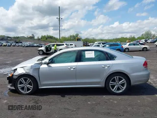 2014 Volkswagen Passat SE with VIN 1VWBT7A32EC070023, listed as a IAAI auction lot 42202567 with 116,438 mi miles and . Bid and sale history available at DreamBid. Image 14.