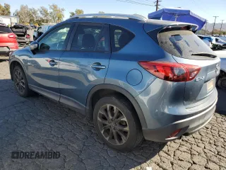 2016 Mazda CX-5 Grand Touring with VIN JM3KE2DY8G0644790, listed as a Copart auction lot 82060424 with 0 mi miles and Clean Title. Bid and sale history available at carsss.com. Image 2.