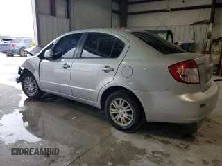 2012 Suzuki SX4 LE with VIN JS2YC5A34C6304150, listed as a Copart auction lot 48629255 with 104,658 mi miles and Salvage Title. Bid and sale history available at carsss.com. Image 2.