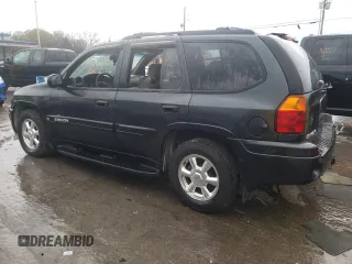 2004 GMC Envoy SLT with VIN 1GKDT13S042310076, listed as a Copart auction lot 79965854 with 220,506 mi miles and Salvage Title. Bid and sale history available at carsss.com. Image 2.