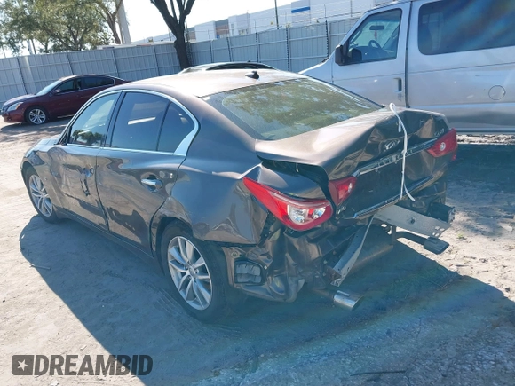 2015 Infiniti Q50 Premium z VIN JN1BV7AR3FM396882, wystawiony jako IAAI lot #37523335 z przebiegiem 89 761 mil mil oraz . Historia ofert i sprzedaży dostępna na DreamBid. Obrazek 3.
