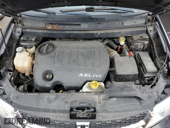 2015 Dodge Journey SXT with VIN 3C4PDCBG7FT669165, listed as a Copart auction lot 62682015 with 145,303 mi miles and Clean title. Bid and sale history available at DreamBid. Image 12.