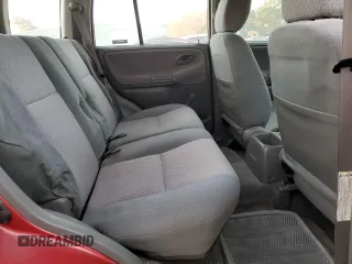 2000 Chevrolet Tracker z VIN 2CNBE13C4Y6944341, wystawiony jako Copart lot #81930714 z przebiegiem 109 501 mil mil oraz Szkoda całkowita • Salvage title. Historia ofert i sprzedaży dostępna na DreamBid. Obrazek 10.