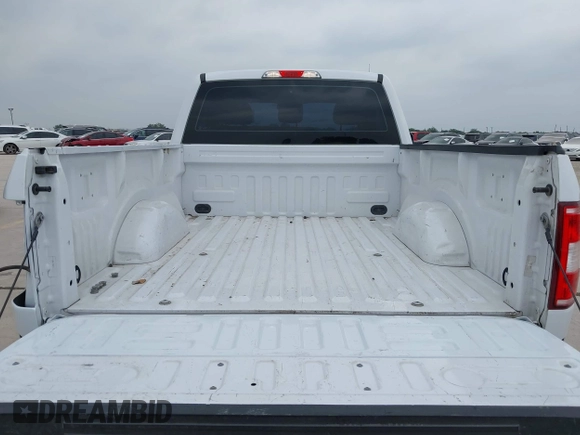 2018 Ford F-150 XL with VIN 1FTMF1CB4JKF54148, listed as a IAAI auction lot 42275439 with 157,811 mi miles and . Bid and sale history available at DreamBid. Image 8.
