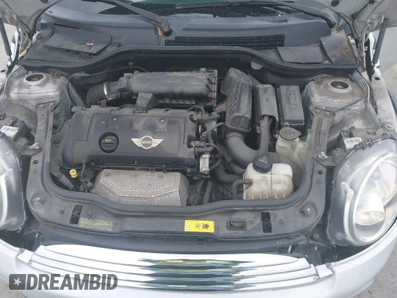 2014 MINI Convertible z VIN WMWZN3C52ET569565, wystawiony jako IAAI lot #42564988 z przebiegiem 66 035 mil mil oraz . Historia ofert i sprzedaży dostępna na DreamBid. Obrazek 10.