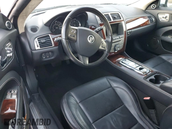 2010 Jaguar XK with VIN SAJWA4GB7ALB35518, listed as a Copart auction lot 86475814 with 32,910 mi miles and Salvage Title. Bid and sale history available at carsss.com. Image 8.
