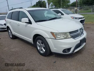 2012 Dodge Journey SXT z VIN 3C4PDCBG0CT204500, wystawiony jako IAAI lot #42518417 z przebiegiem 119 535 mil mil oraz . Historia ofert i sprzedaży dostępna na DreamBid. Obrazek 1.