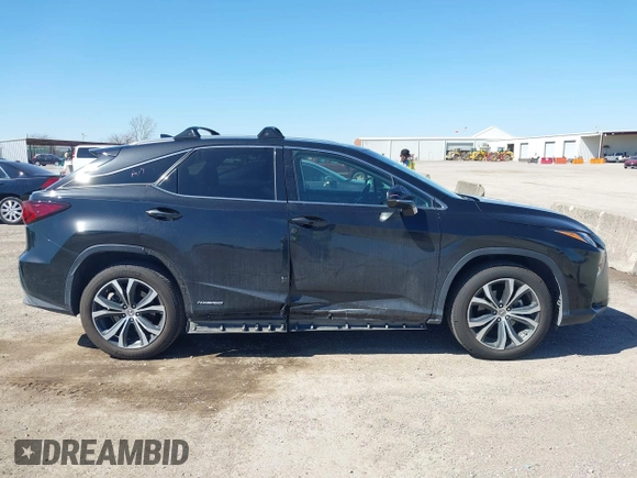 2017 Lexus RX 450h with VIN 2T2BGMCA7HC009792, listed as a IAAI auction lot 41770310 with 62,753 mi miles and . Bid and sale history available at DreamBid. Image 13.