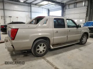 2004 Cadillac Escalade EXT z VIN 3GYEK62NX4G273082, wystawiony jako Copart lot #54826215 z przebiegiem 251 075 mil mil oraz Szkody całkowita. Historia ofert i sprzedaży dostępna na DreamBid. Obrazek 3.