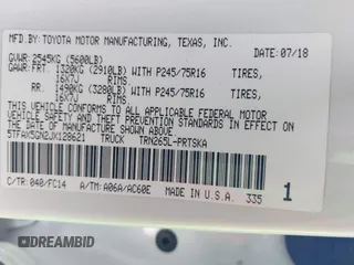 2018 Toyota Tacoma SR with VIN 5TFAX5GN2JX128621, listed as a IAAI auction lot 41797514 with 216,251 mi miles and . Bid and sale history available at DreamBid. Image 9.