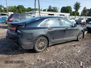 2014 Lincoln MKZ z VIN 3LN6L2J90ER802254, wystawiony jako Copart lot #58727025 z przebiegiem 172 297 mil mil oraz Szkoda całkowita • Salvage title. Historia ofert i sprzedaży dostępna na DreamBid. Obrazek 3.