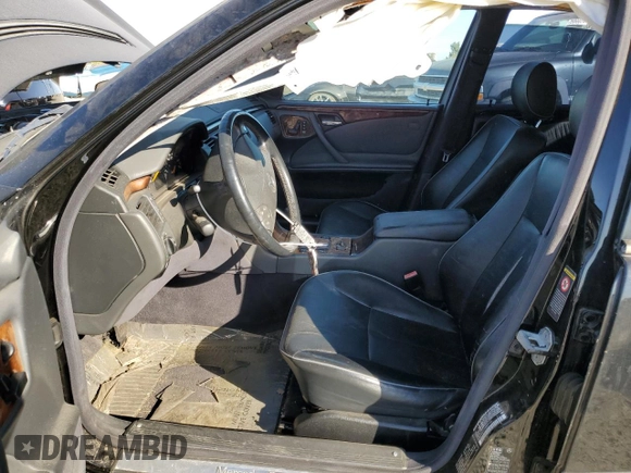 2001 Mercedes-Benz E-Class AWD with VIN WDBJF82JX1X044733, listed as a Copart auction lot 74825034 with 153,046 mi miles and Salvage Title. Bid and sale history available at carsss.com. Image 7.