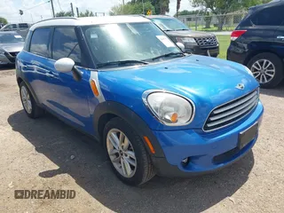 2014 MINI Countryman with VIN WMWZB3C52EWR40215, listed as a IAAI auction lot 42687571 with 106,338 mi miles and . Bid and sale history available at DreamBid. Image 1.