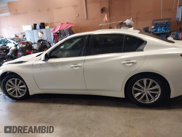 2014 Infiniti Q50 Premium z VIN JN1BV7AP0EM679026, wystawiony jako IAAI lot #42225108 z przebiegiem 96 656 mil mil oraz . Historia ofert i sprzedaży dostępna na DreamBid. Obrazek 15.