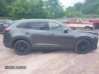 2022 Mazda CX-9 Touring Plus with VIN JM3TCBAY2N0611876, listed as a IAAI auction lot 42369073 with 37,639 mi miles and . Bid and sale history available at DreamBid. Image 13.