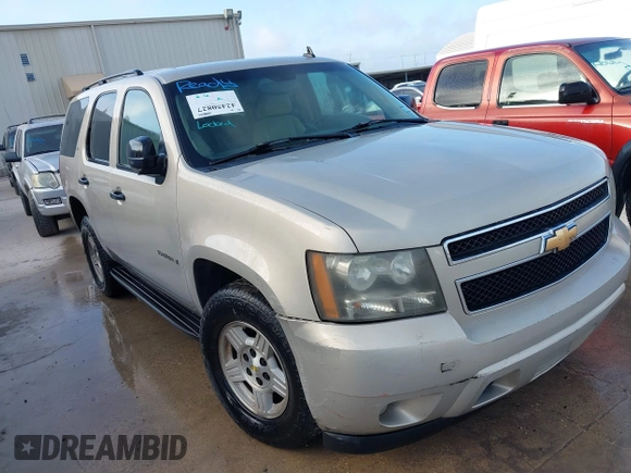 2007 Chevrolet Tahoe LS z VIN 1GNEC130X7R164139, wystawiony jako IAAI lot #42450827 z przebiegiem 232 144 mil mil oraz . Historia ofert i sprzedaży dostępna na DreamBid. Obrazek 1.