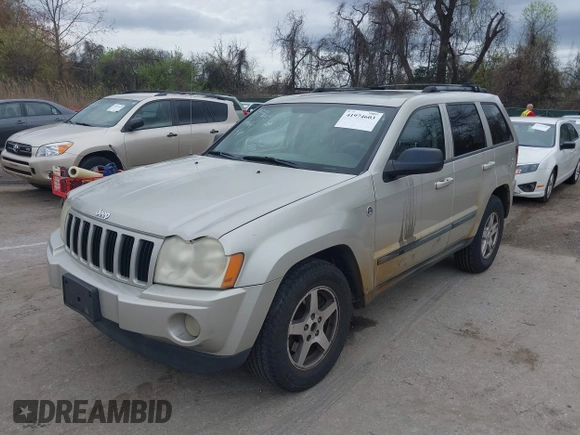2007 Jeep Grand Cherokee Laredo z VIN 1J8HR48P77C548578, wystawiony jako IAAI lot #41974603 z przebiegiem 179 280 mil mil oraz . Historia ofert i sprzedaży dostępna na DreamBid. Obrazek 2.
