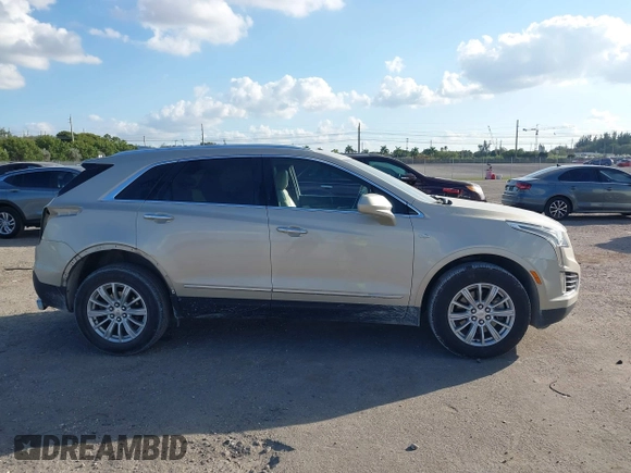 2017 Cadillac XT5 FWD with VIN 1GYKNARS0HZ174625, listed as a IAAI auction lot 41520634 with 116,169 mi miles. Bid and sale history available at carsss.com. Image 14.